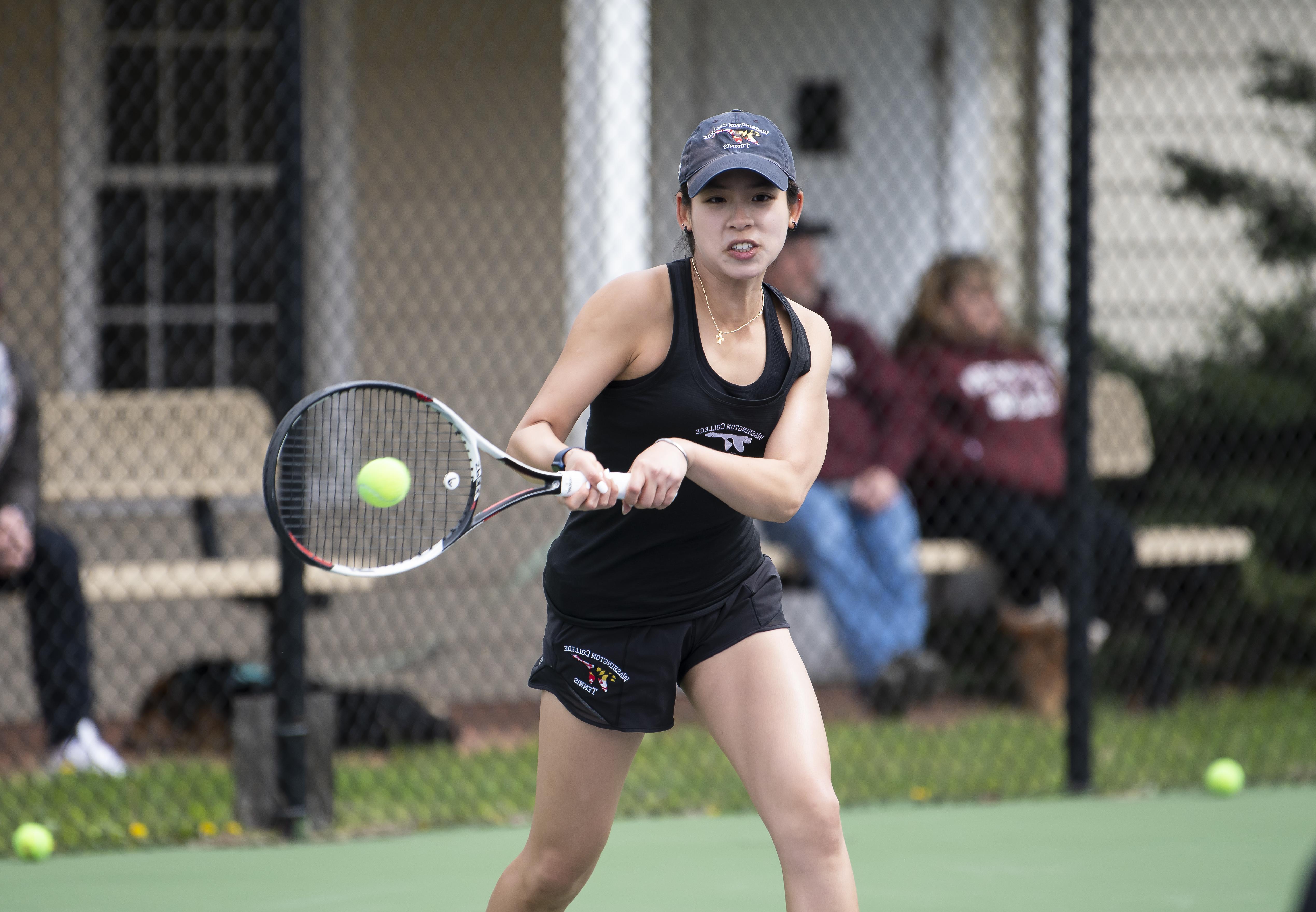 Van playing tennis 